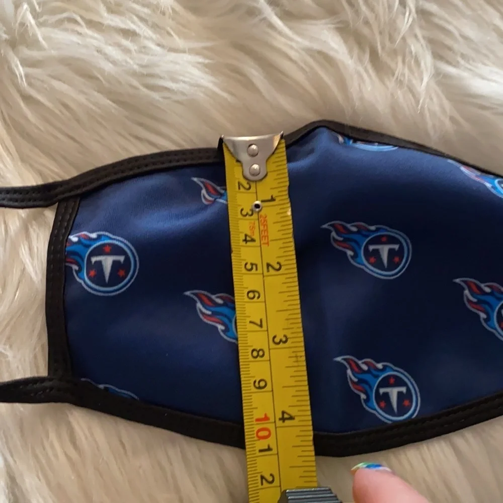 New without tags Tennessee Titans face mask